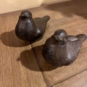 2 cast iron birds